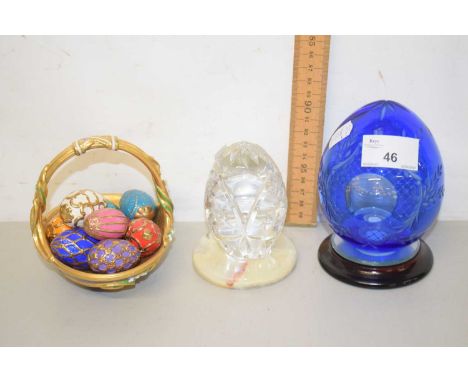 Three various egg ornaments including cut glass