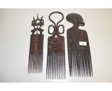 Three various tribal art combs
