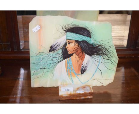 A onyx panel decorated with a portrait of a Native American
