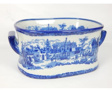A blue and white Ironstone style foot bath / planter with Italian architectural designs, 48cm max. w.