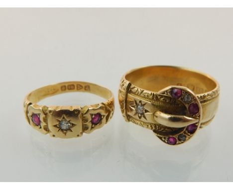 Edwardian 18ct yellow gold ruby and diamond buckle ring and an 18ct ruby and diamond three stone ring (sizes O and M respecti