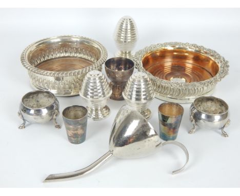 Two silver plated wine coasters, a wine funnel, beehive cruet set, egg cup, two vodka cups and two salts, (11)