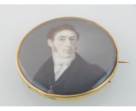 Mid 19th century portrait miniature of a gentleman, wearing a white smock and black coat 6cm tondo.