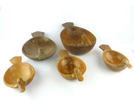 A selection of five folk carved wooden kovsh form duck bowls. (5)