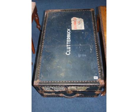 A large blue travel trunk