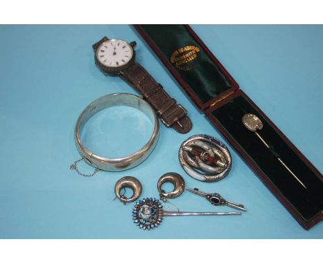 A silver bangle, various Scottish style jewellery and an Oriental enamelled pin etc.