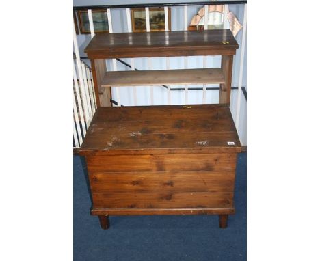 A pine bookcase and pine trunk