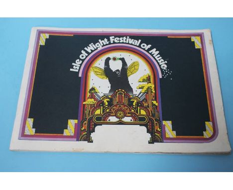 A copy of the 1969 Isle of Wight music festival programme, including The Who, Bob Dylan, The Moody Blues etc.