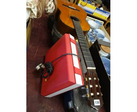 Two guitars and a record player