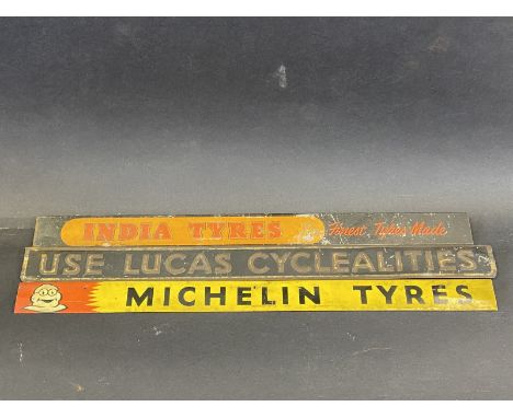 An India Tyres shelf strip, a Lucas embossed shelf strip and one other.