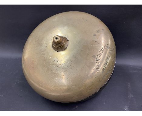 A large brass fire engine bell, stamped John Morris &amp; Sons Ltd. Manchester. 