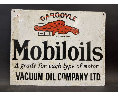 A Gargoyle Mobiloils double sided enamel sign, lacking hanging flange, bearing the unusual words 'A grade for each type of mo