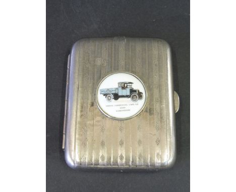 A Morris Commercial Cars silver plated cigarette case, the lid inset with a circular porcelain or enamel disc depicting an Ed