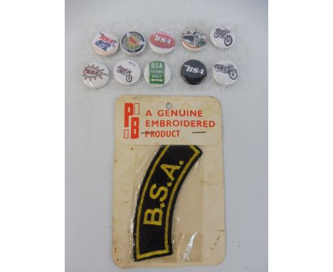 An early original BSA sew on patch plus ten small modern badges. 
