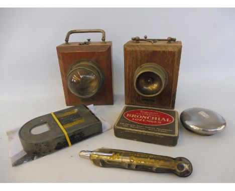 A box of collectables including a magazine/cartridge for RAF WWII Spitfire G45 gun camera, wooden torches, a tyre pressure ga