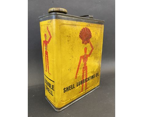 A good Shell Lubricating Oil gallon can with 'robot/stick man' motifs, good bright colour and original cap.