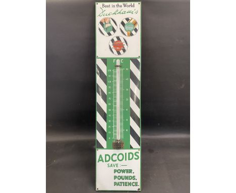 A Duckham's Adcoids black and white enamel thermometer, in excellent condition, 11 x 45 1/4". 