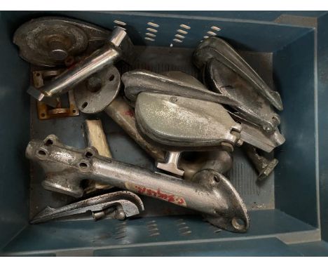 A box of Lagonda LG45 sundries including a headlamp bracket, filler caps etc.