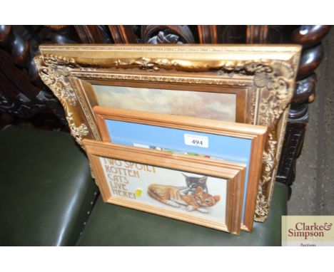 A novelty cat print, one other print and an oleograph depicting sheep