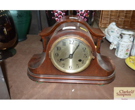 A two hole mantle clock