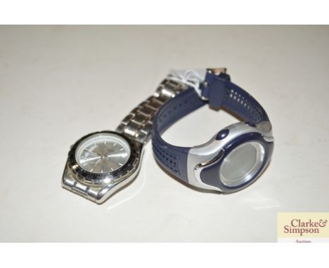 A digital wrist watch together with a Van Heusen wrist watch 