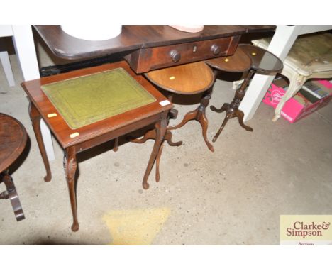 A leather topped side table together with three tripod wine tables 