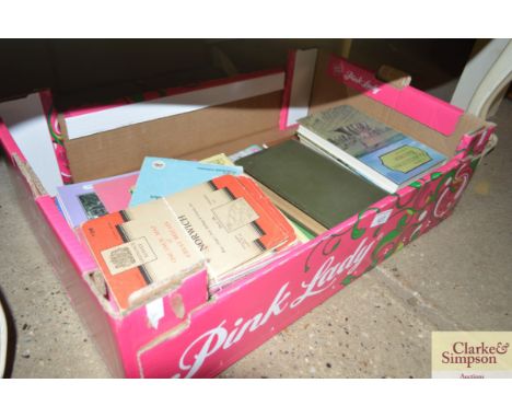 A box containing ordnance survey maps, books etc 