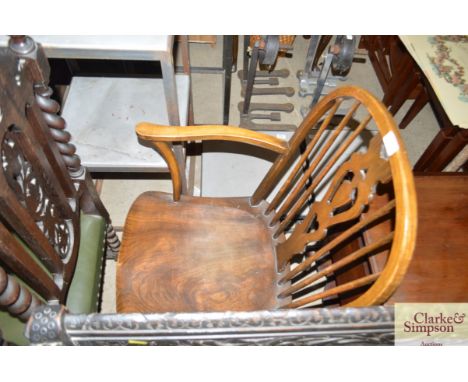 An elm seated stick back chair