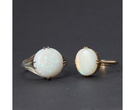 Two opal rings to include an 18ct yellow gold ring set with an oval cabochon cut opal, approx. 2.00 carats, 11.5mm x 9.5mm x 