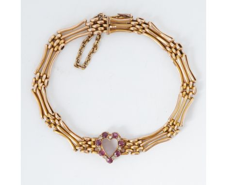 A 15ct yellow gold three bar gate bracelet with a cut-out ruby &amp; diamond heart, circa 1920, total ruby weight approx. 0.5