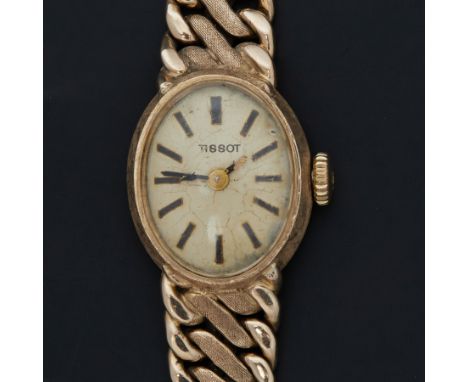 Tissot, a 9ct yellow gold vintage Tissot ladies wristwatch on a 9ct yellow gold bracelet, manual wind. total weight 24.33gm, 