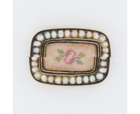 A Georgian yellow gold, black enamel seed pearl &amp; flower tapestry brooch, the tapestry being under a glass panel, with a 