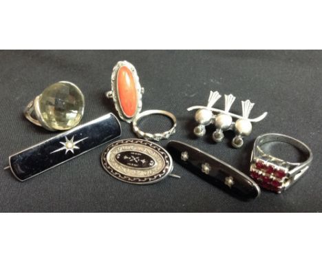 A silver and enamel oval panel brooch; others;  a silver and coral dress ring;  a 1970's ring; etc. (8)