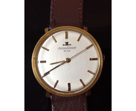 A Jaeger LeCoultre Club gentleman's gold cased wrist watch, silvered circular dial, baton markers, centre seconds, manual mov