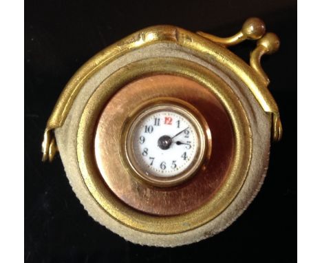 An unusual gold coloured metal shirt/collar stud watch, white enamel dial, Arabic numerals, button wind movement, with mother