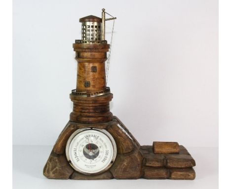 A carved wooden lighthouse barometer H 31cm