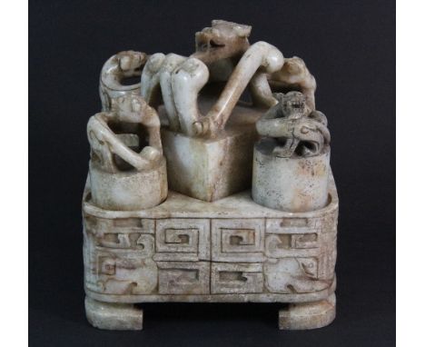 A rare Chinese carved jade / hardstone seal stand with 5 seals H 14cm x 13cm x 13cm (minor repair to one foot)