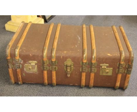 A canvas and wood cabin trunk