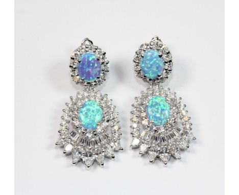 An impressive pair of 925 silver and faux opal drop earrings