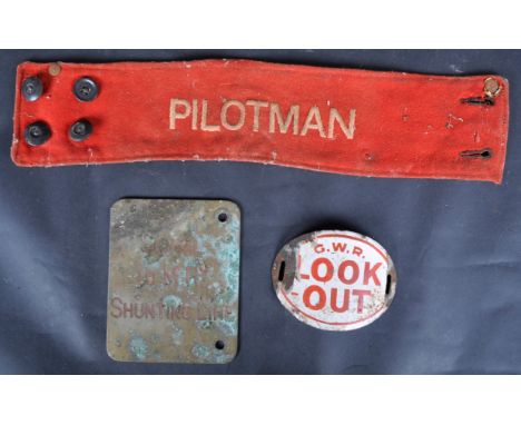 A collection of vintage railway memorabilia to include: BR-WR (British Railways Western Region) Pilotman's armband, a Great W