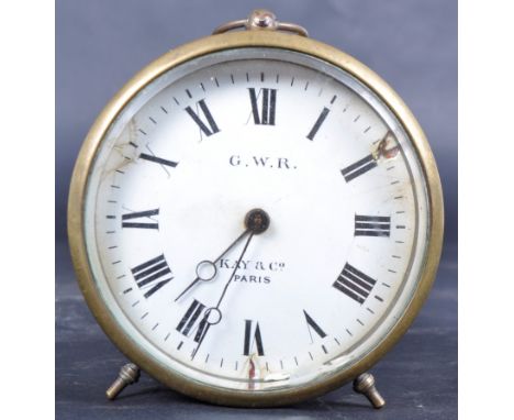 An early 20th century Great Western Railway Brass Drum Clock. A signal box clock with enamelled dial G.W.R KAY &amp; Co. Pari