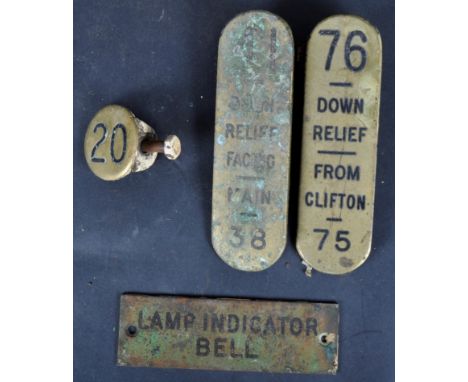 A collection of Great Western Railway Brass Lever Plates: 41 and 76, a circular brass level no. 20 and a Shelf Plate. The bra