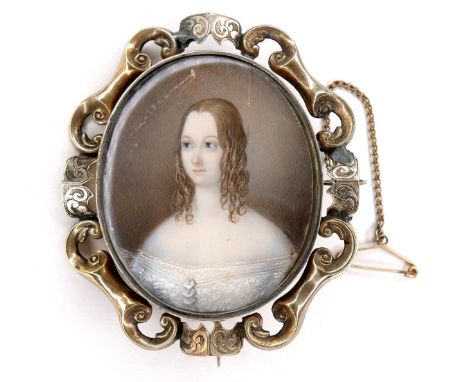 A Victorian gold framed portrait miniature brooch, depicting a lady in white lace, silk backed, 5.3 by 6cm, 24.6g.Notes: Ivor