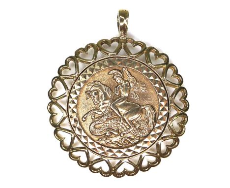 A 9ct gold George & Dragon medallion, maker S&K, 19mm, fitted into a 9ct gold pendant coin mount, with heart shaped border an