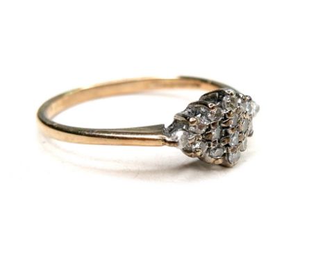 A 9ct gold and diamond cluster ring, set with sixteen brilliant cut diamonds, each 1.4mm, in a lozenge shape, on narrow band,