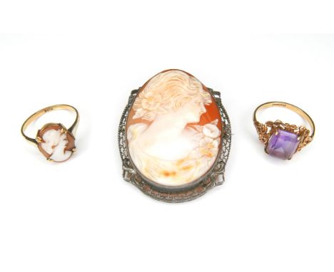 Two 9ct gold rings, comprising a rectangular cut amethyst stone ring, stone 10 by 7.9mm, size L, a cameo ring, size N, overal