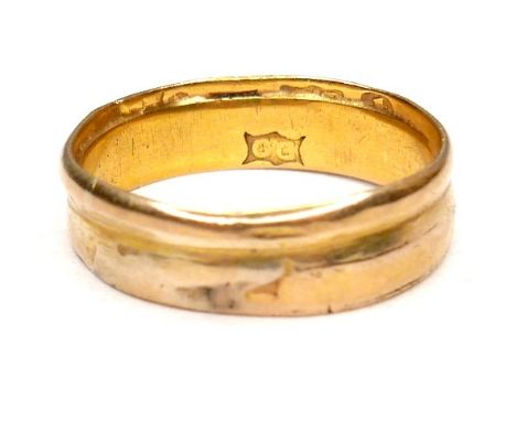 A gold wedding band ring, formed from two separate thinner rings joined together, marks partially covered, tests as 15 to 18c