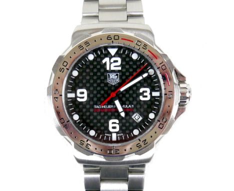 A TAG Heuer Formula 1 stainless steel gentleman's wristwatch, 200m Professional, model WAH1115, the circular black carbon fib