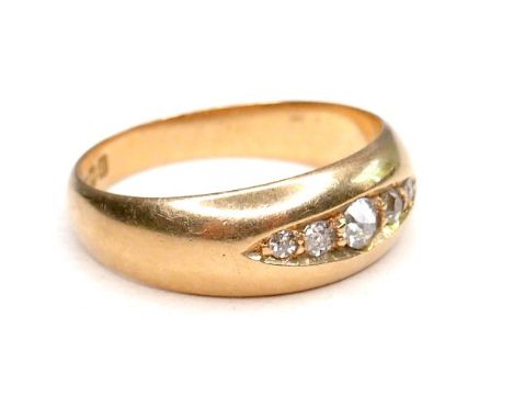 An 18ct gold and diamond five stone ring, formed of graduated old cut stones, largest 2.5mm, size L, 3.9g. 