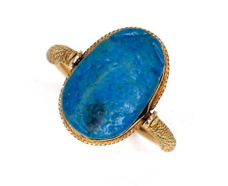 A gold swivel ring set with Ancient Egyptian turquoise scarab bead, the band of later date in Ancient Egyptian style with rop